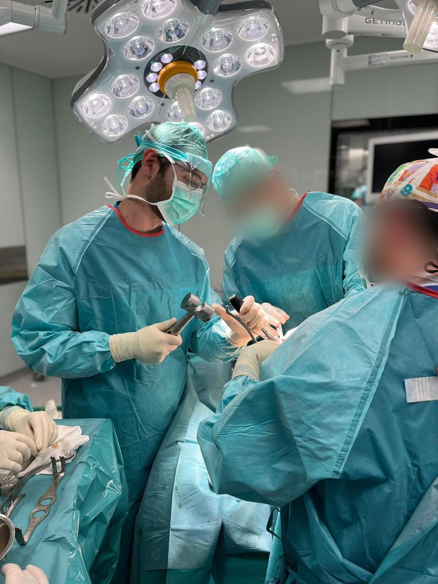 Dr. Coifman performing joint replacement surgery